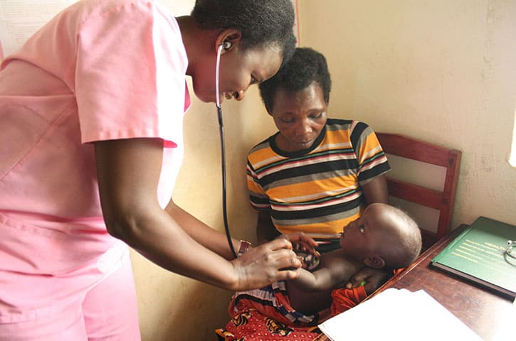 Nurse at clinic at REACH Uganda